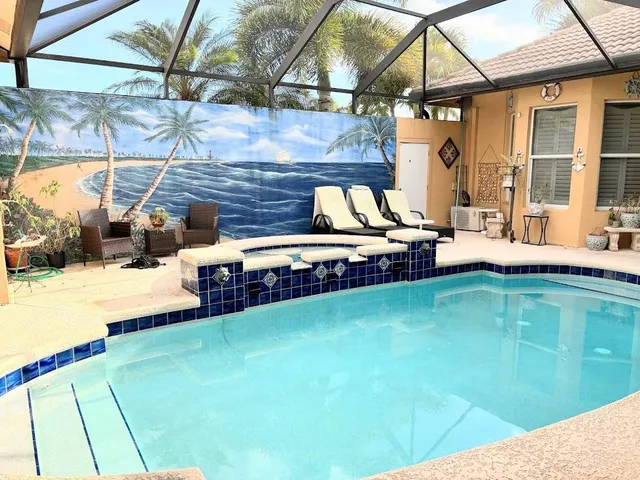 a view of a patio with swimming pool