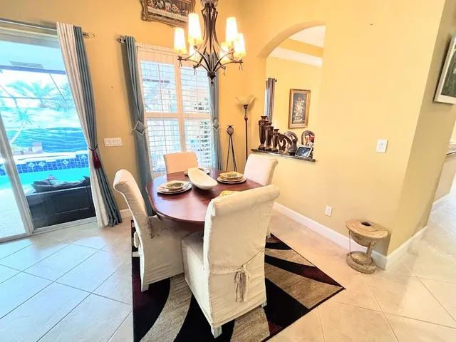 a view of a bathroom with a sink and wooden floor