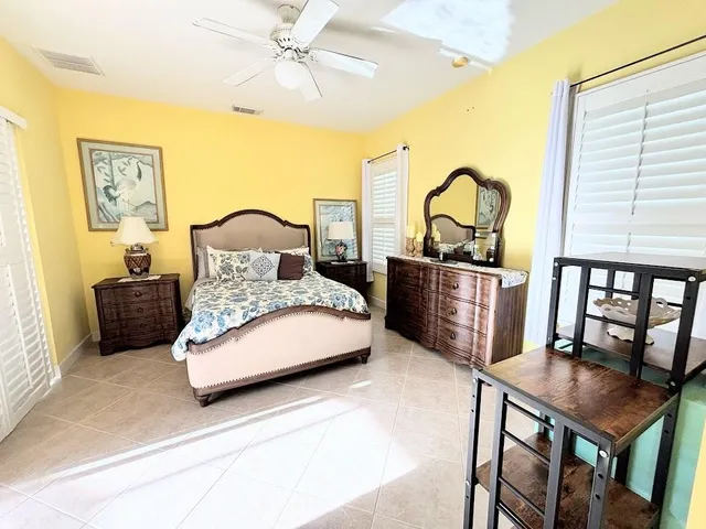 a view of a backyard with sitting area