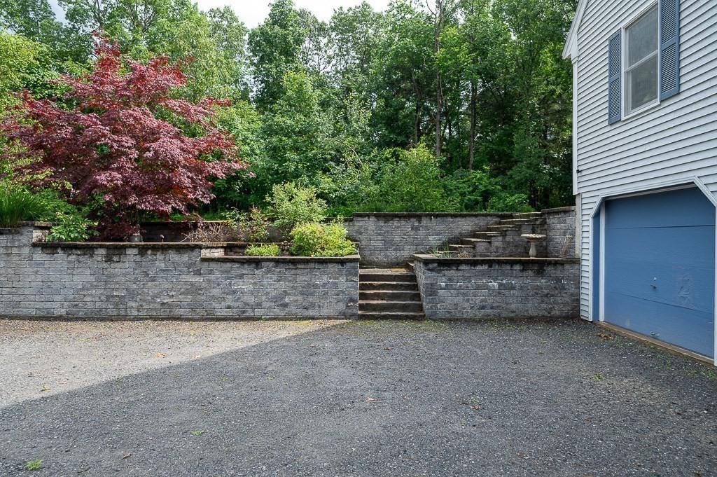 65 Lancaster Road Shirley, MA 01464 - Photo 32 of 42 a view of a backyard