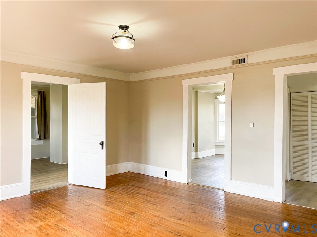 1016 Court Street Victoria, VA 23974 - Photo 14 of 29 a view of an empty room and wooden floor