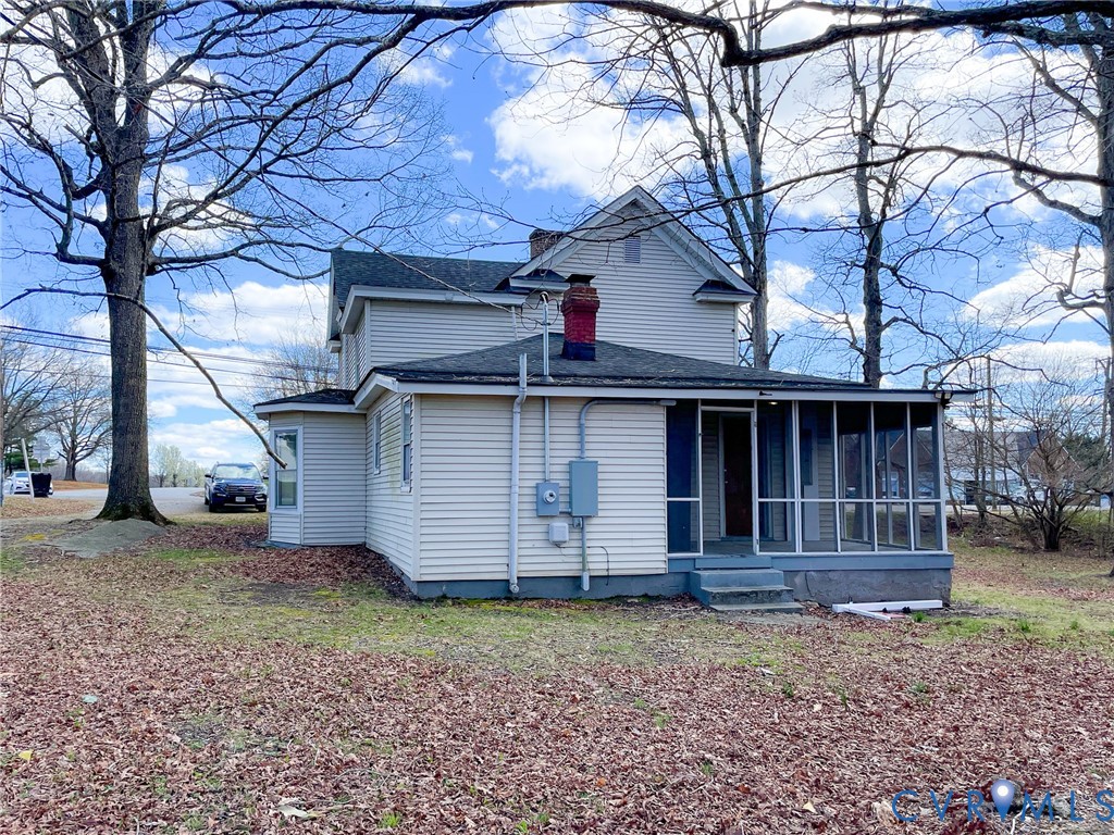 1016 Court Street Victoria, VA 23974 - Photo 28 of 29 a view of a house with a yard and large tree