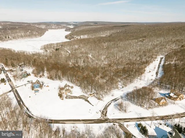an aerial view of residential building and parking space