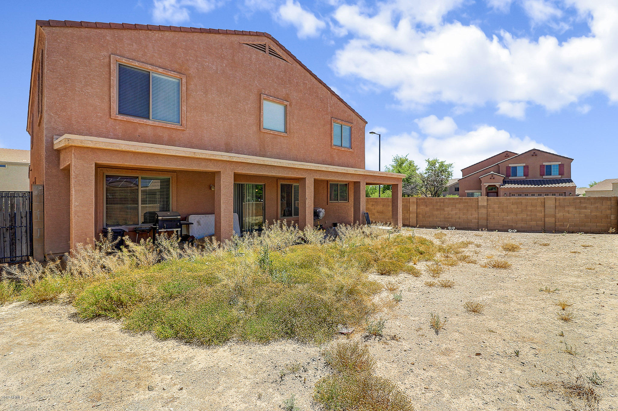 23674 West Pecan Road Buckeye, AZ 85326 - Photo 31 of 32 Backyard waiting for your touch