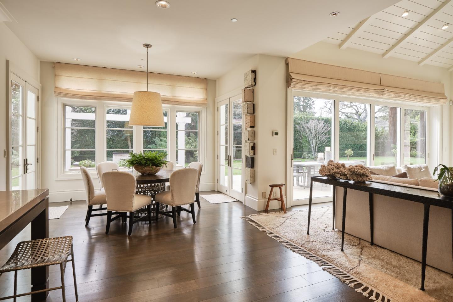 138 Almendral Avenue Atherton, CA 94027 - Photo 15 of 44 a dining room with furniture window and wooden floor