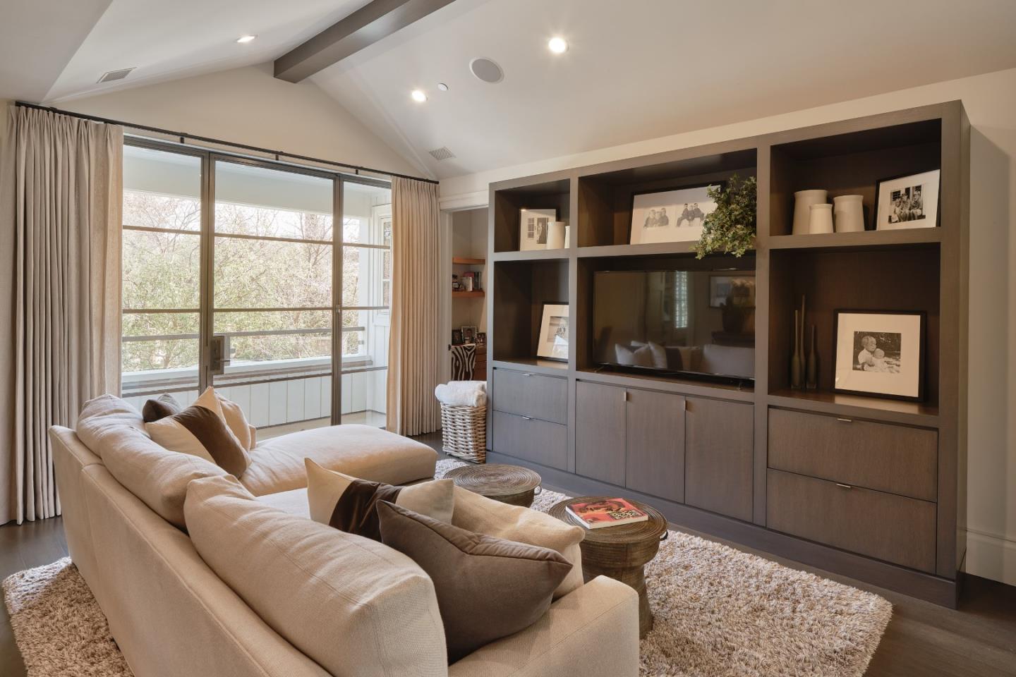 138 Almendral Avenue Atherton, CA 94027 - Photo 24 of 44 a living room with furniture and a window