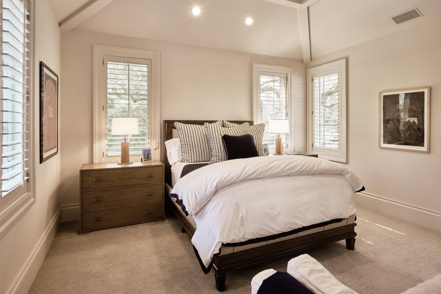 138 Almendral Avenue Atherton, CA 94027 - Photo 31 of 44 a bed room with a bed and a window