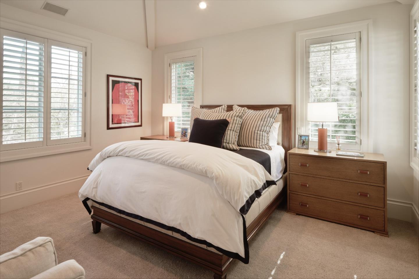 138 Almendral Avenue Atherton, CA 94027 - Photo 32 of 44 a bed room with a bed and a window