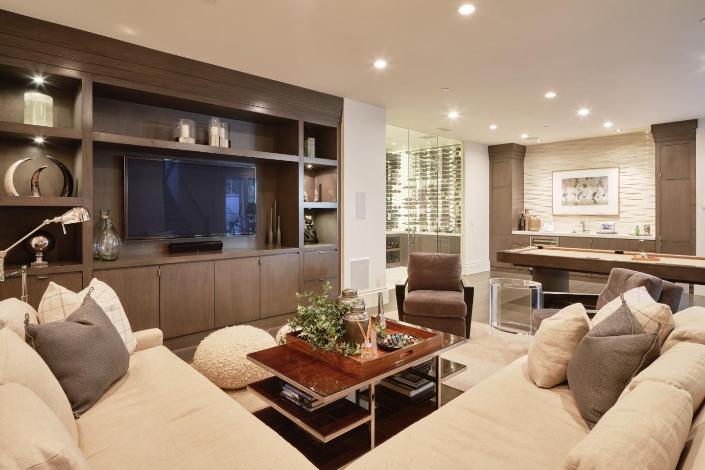138 Almendral Avenue Atherton, CA 94027 - Photo 36 of 44 a living room with furniture and a flat screen tv