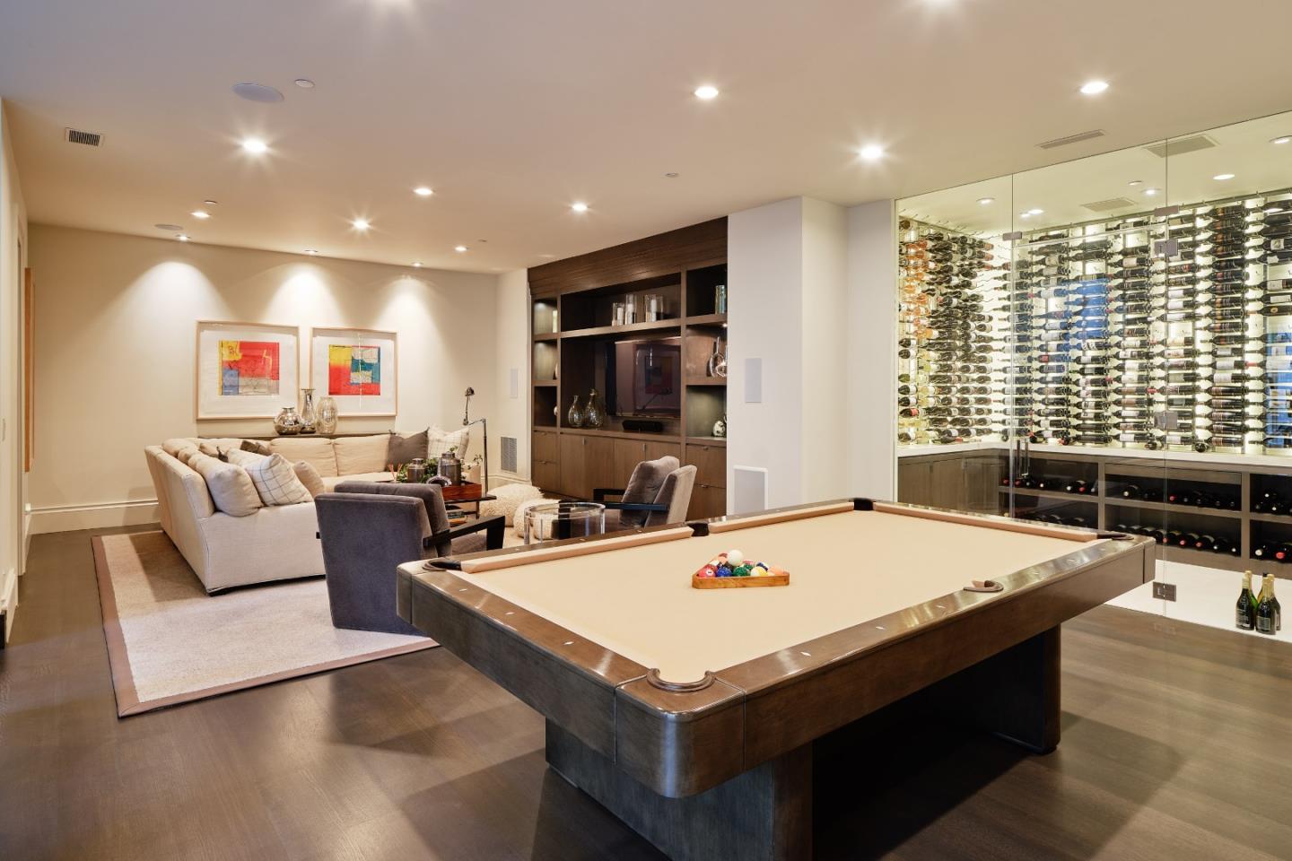 138 Almendral Avenue Atherton, CA 94027 - Photo 37 of 44 a living room with hard wood floors and kitchen view