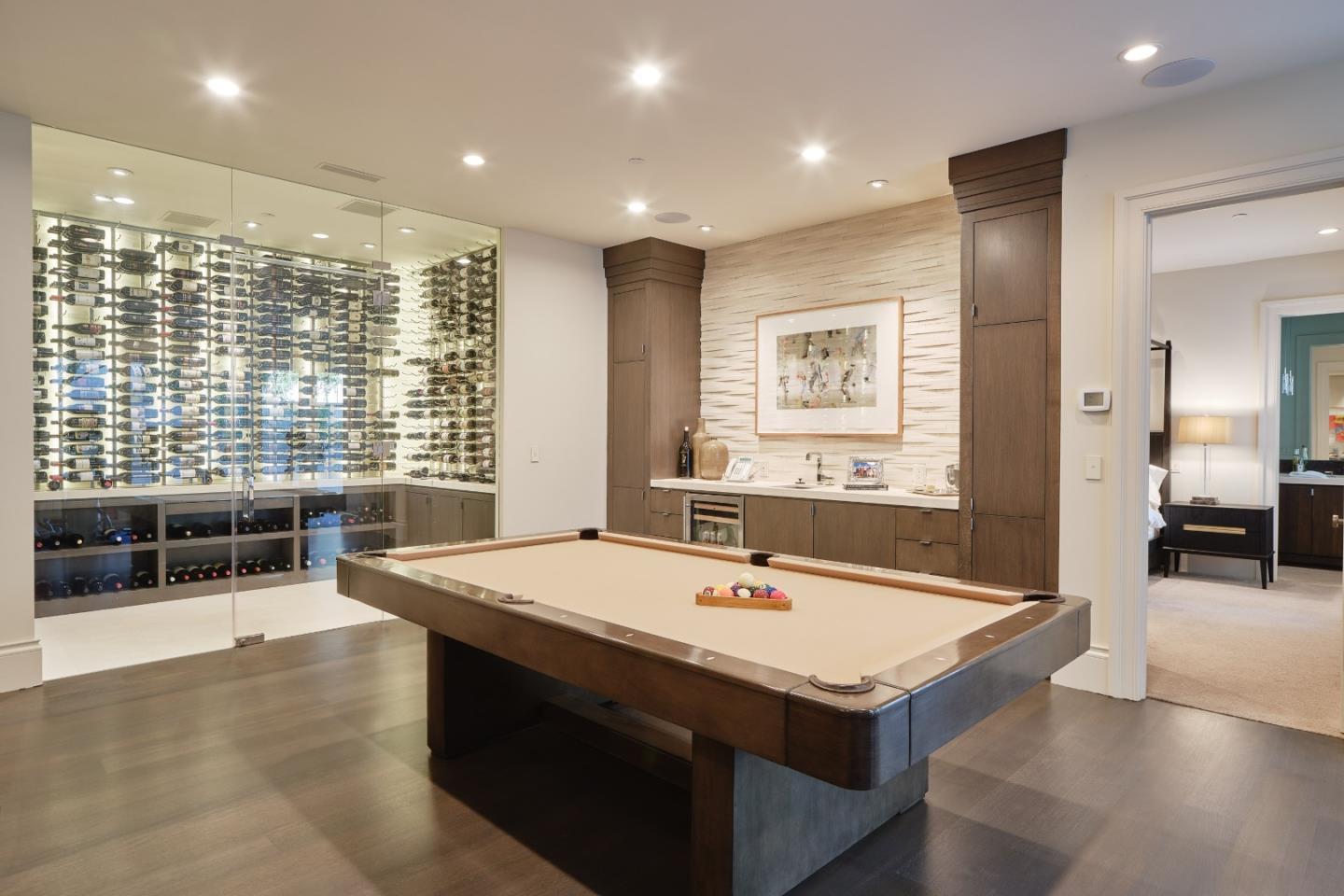 138 Almendral Avenue Atherton, CA 94027 - Photo 38 of 44 a view of a kitchen with kitchen island a sink table and chairs