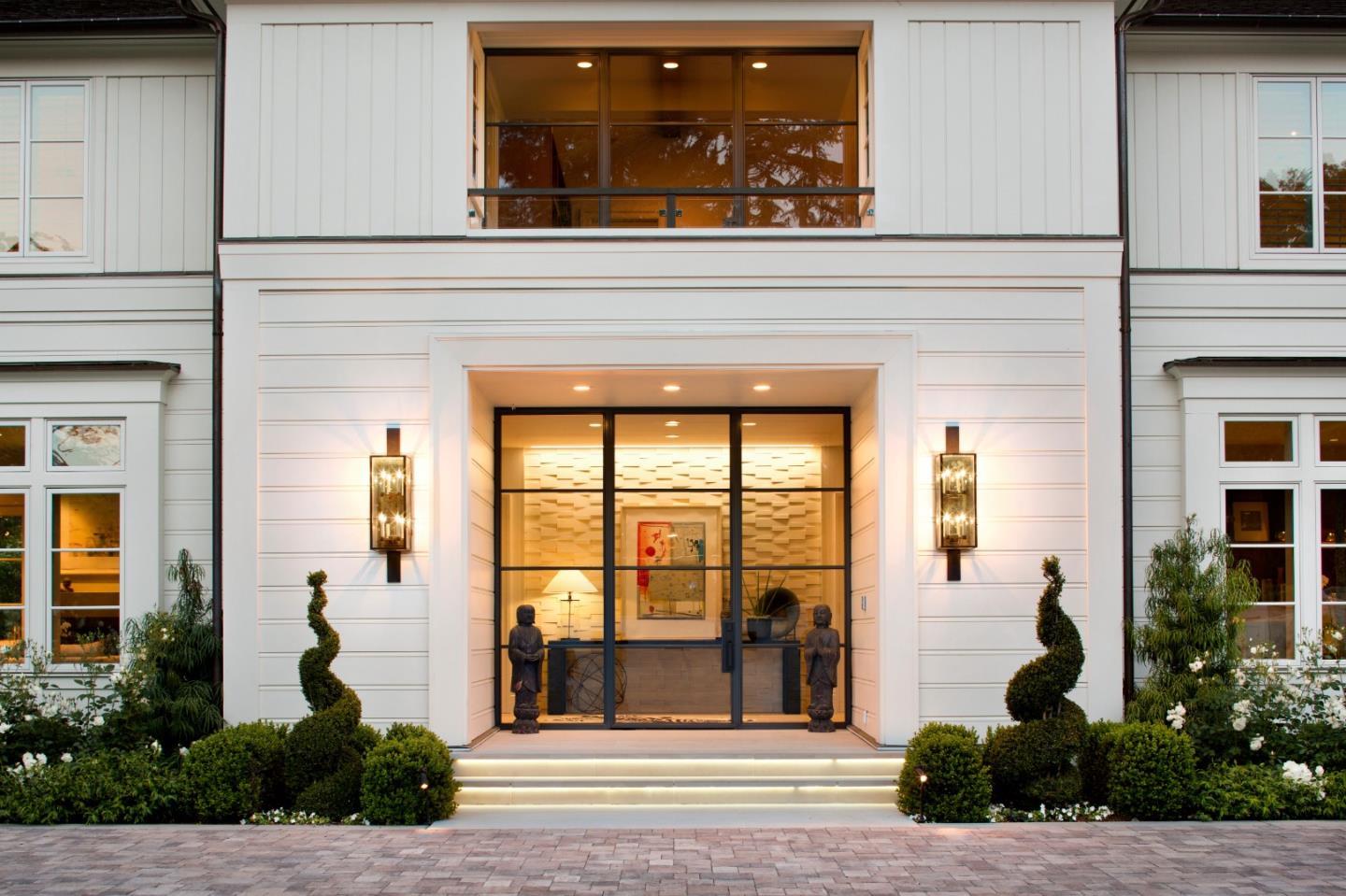 138 Almendral Avenue Atherton, CA 94027 - Photo 4 of 44 a front view of a house with a porch