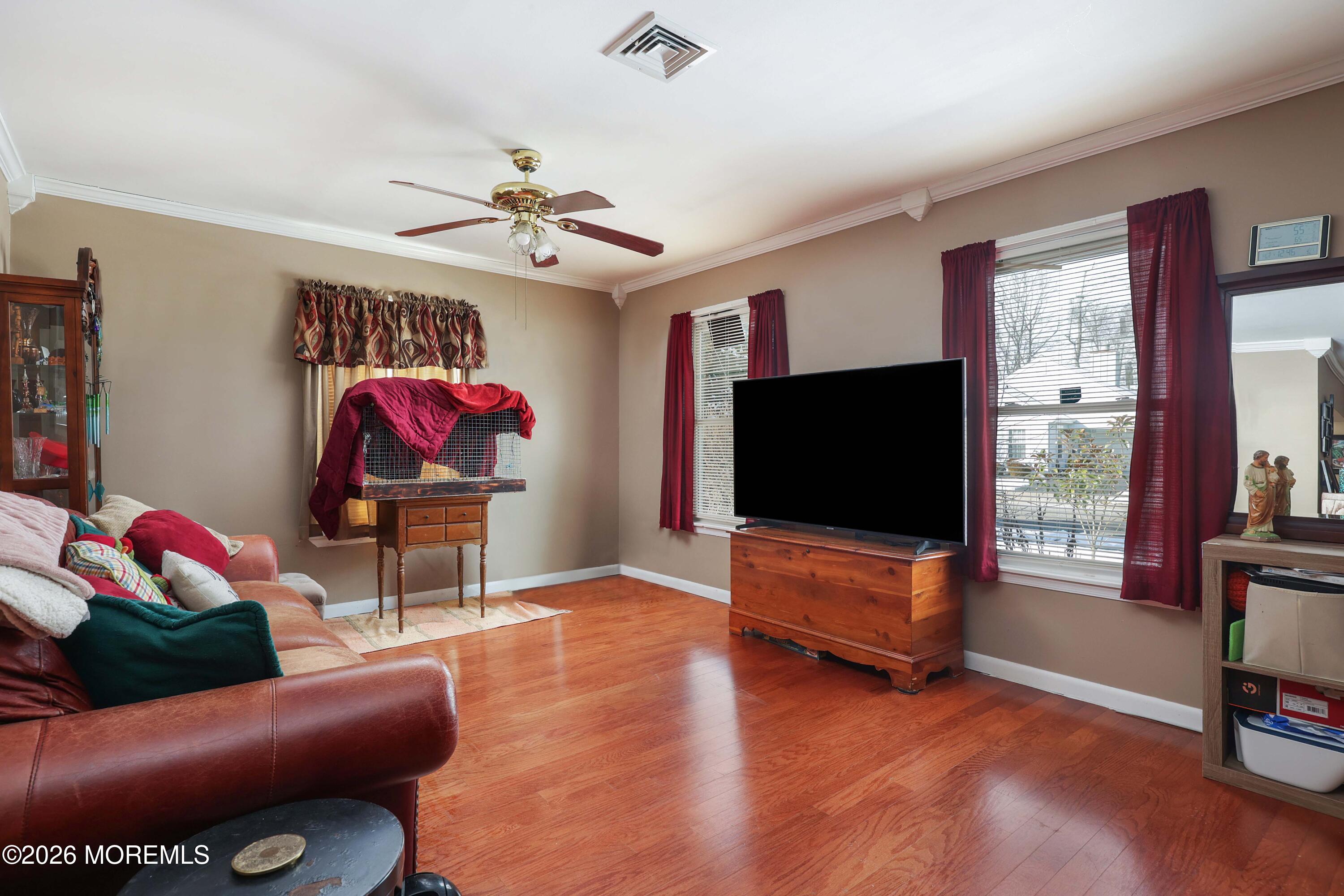 74 Sheffield Place Southampton, NJ 08088 - Photo 5 of 20 a living room with furniture workspace and a flat screen tv