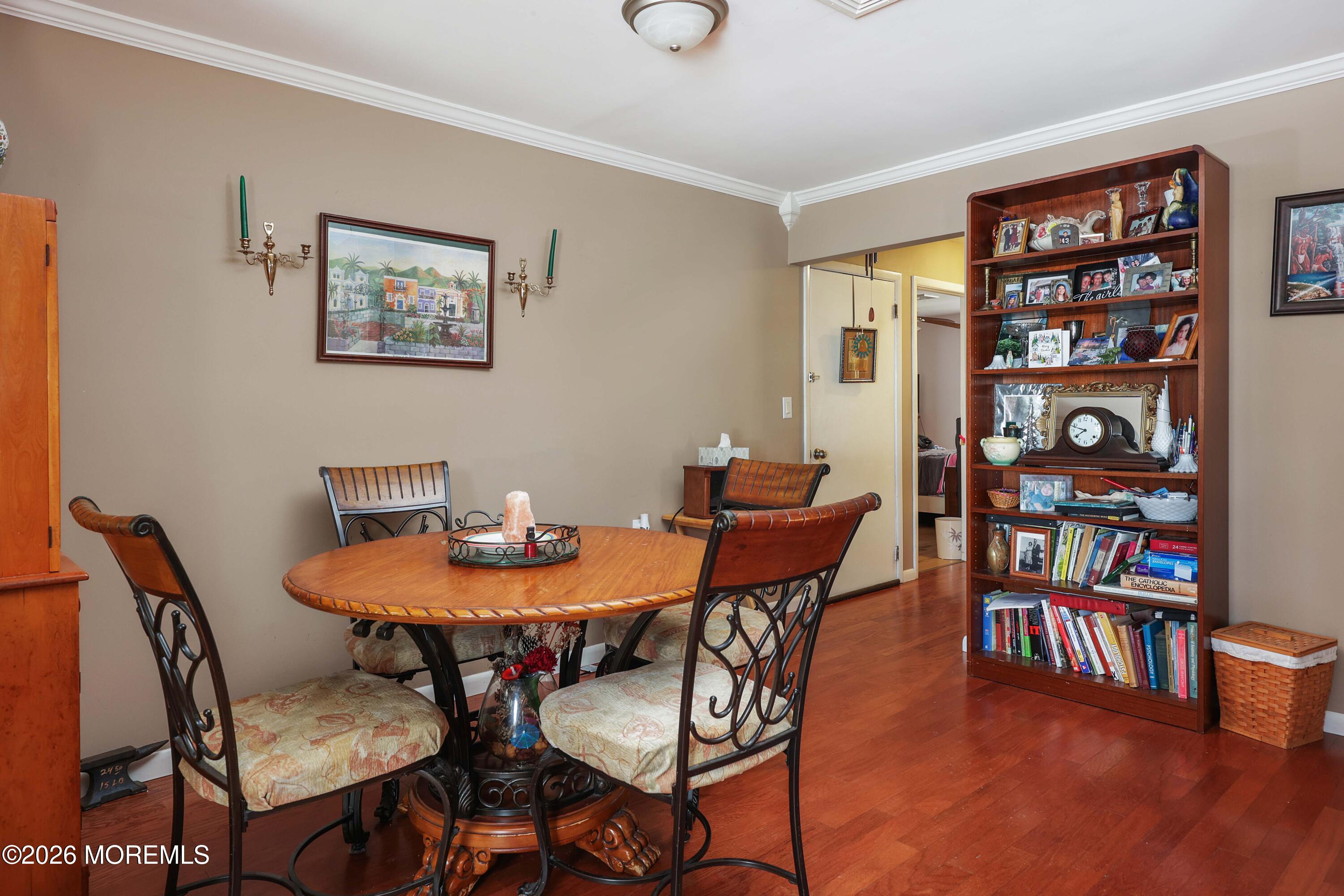 74 Sheffield Place Southampton, NJ 08088 - Photo 7 of 20 a view of a dining room with furniture and wooden floor