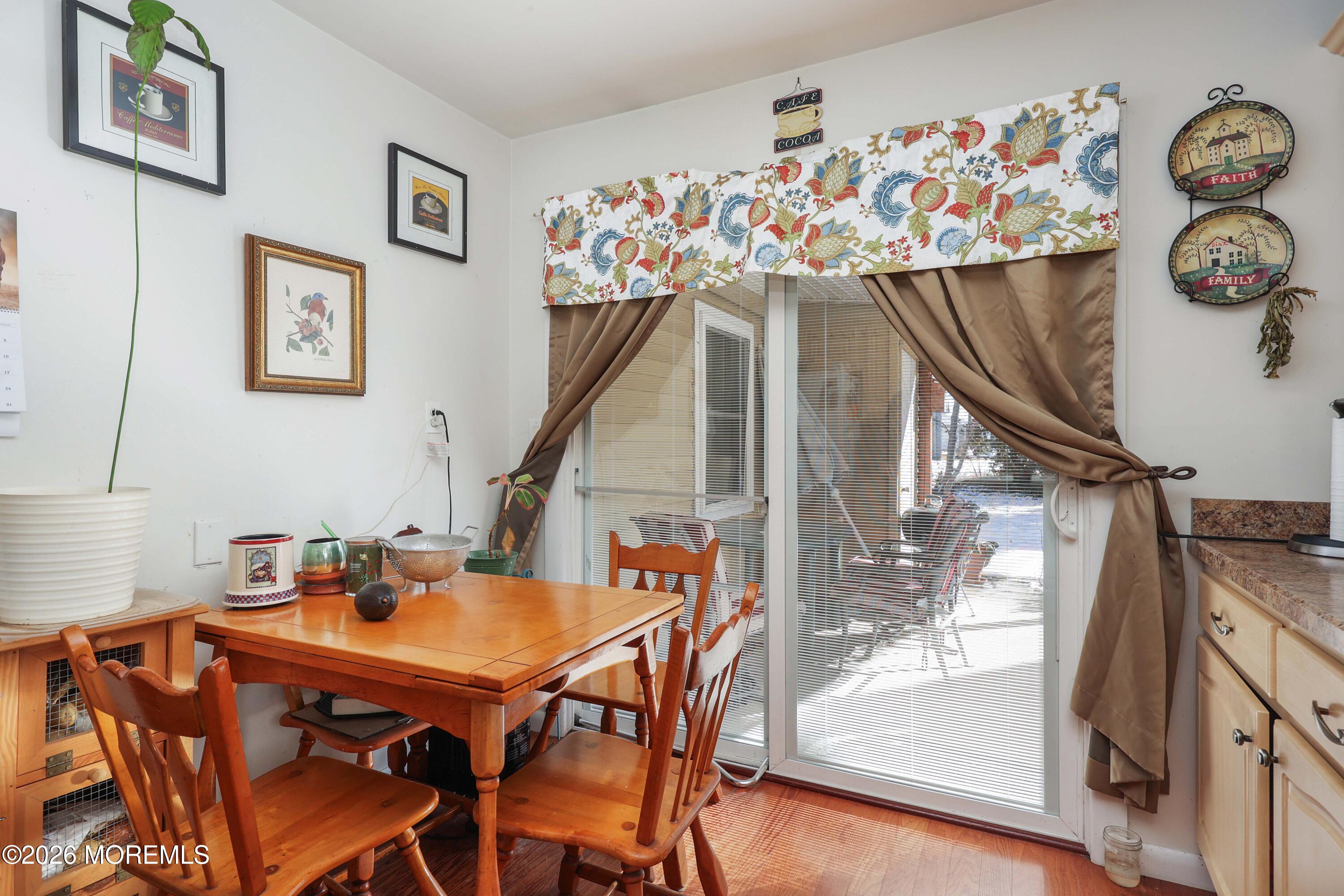 74 Sheffield Place Southampton, NJ 08088 - Photo 10 of 20 a view of a dining room with furniture and chandelier