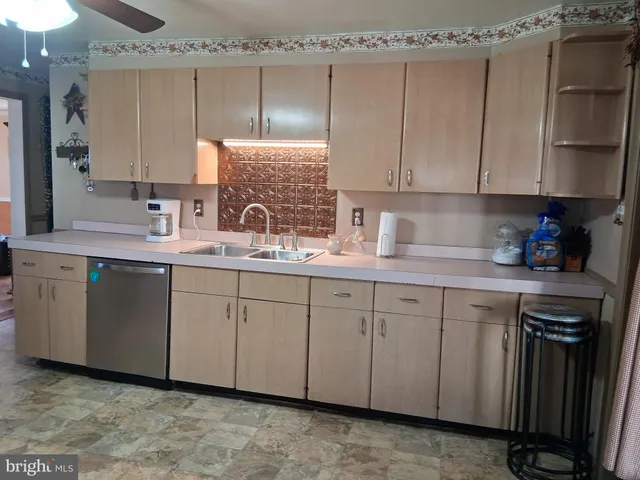 a room with a bed and a window