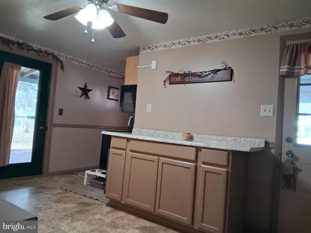 a view of a hallway with entryway