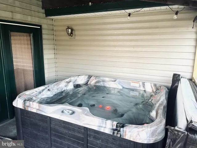 a view of a yard in front view of a house