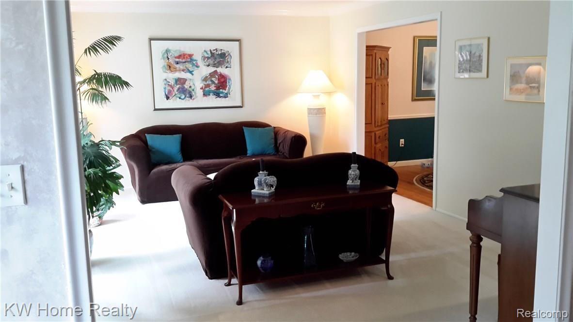 44711 Brookside Road Plymouth, MI 48170 - Photo 15 of 45 Large living room with lots of natural light