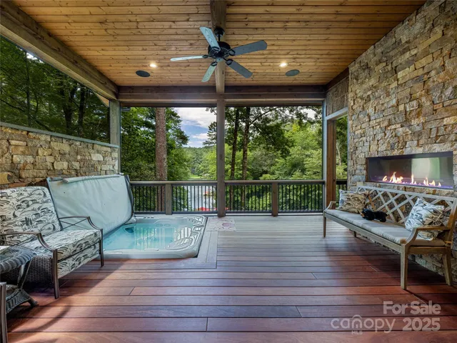 a bathroom with a granite countertop tub and a sink