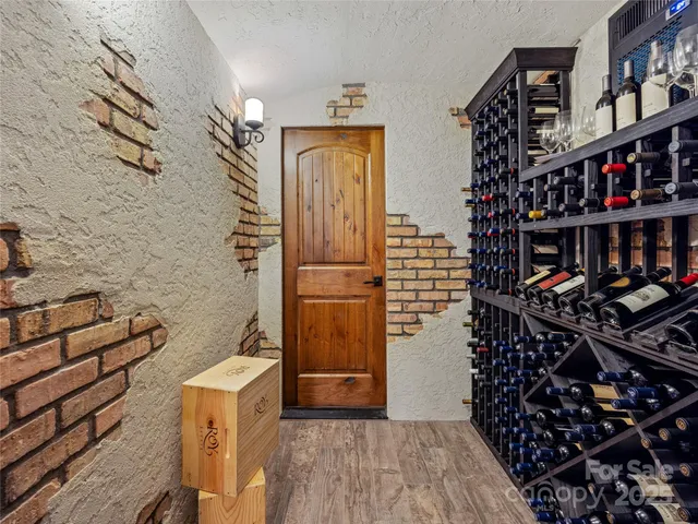 a view of a swimming pool with furniture