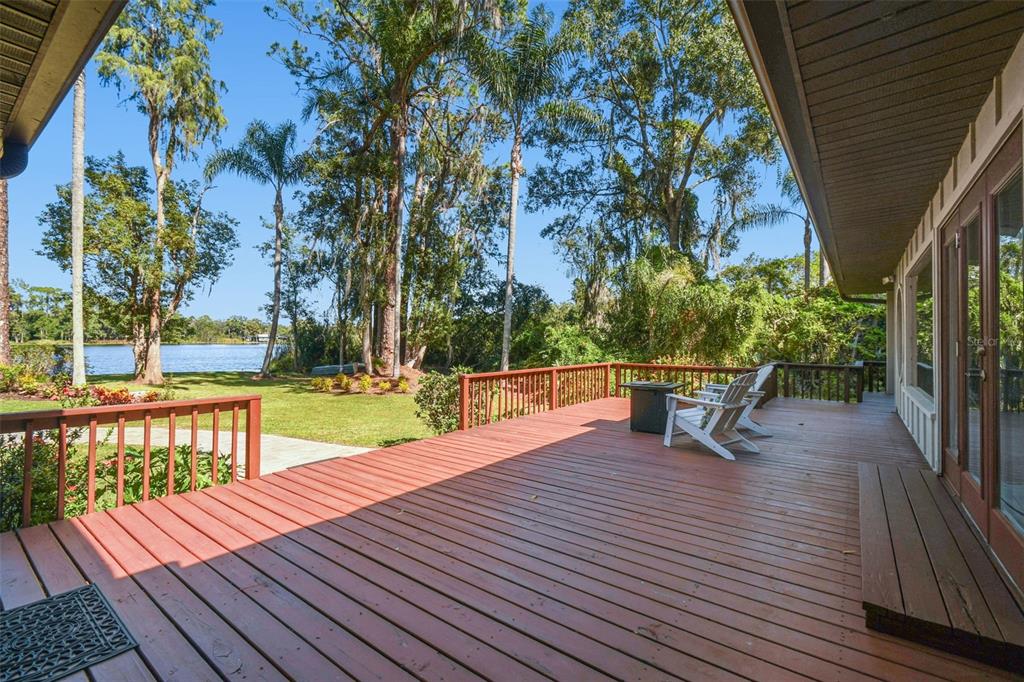 8011 North Mobley Road Odessa, FL 33556 - Photo 11 of 86 a view of outdoor sitting space with wooden deck