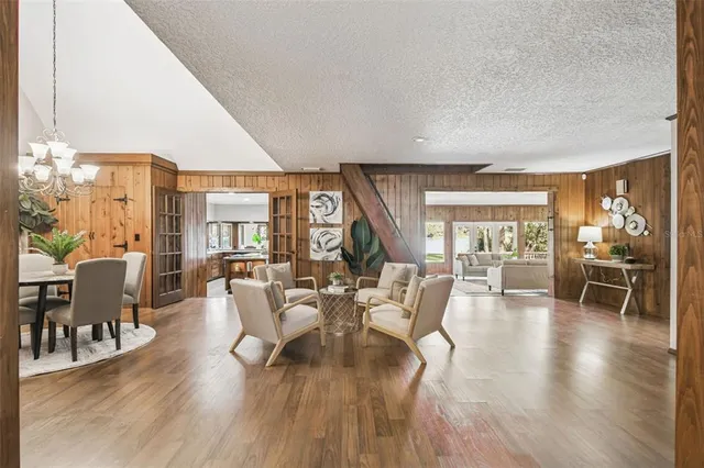 a living room with furniture and a table