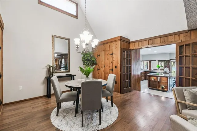 a view of living room with furniture and a fireplace