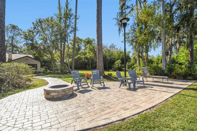 a view of outdoor sitting space with wooden deck
