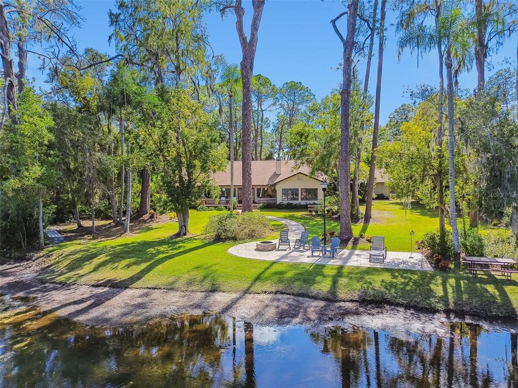 8011 North Mobley Road Odessa, FL 33556 - Photo 85 of 86 a view of a park with palm trees