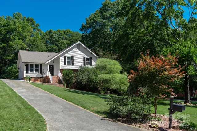 a house view with a garden space
