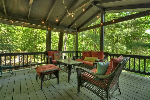 a outdoor space with patio furniture and a potted plant