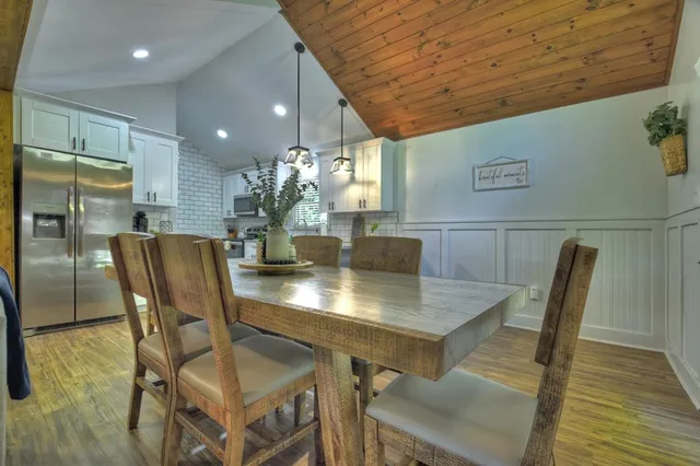 a view of a dining room with furniture