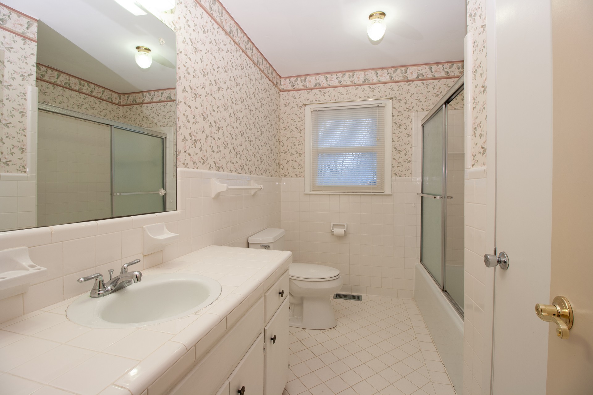 1431 Harrison Road Murfreesboro, TN 37128 - Photo 13 of 17 a bathroom with a sink toilet and shower