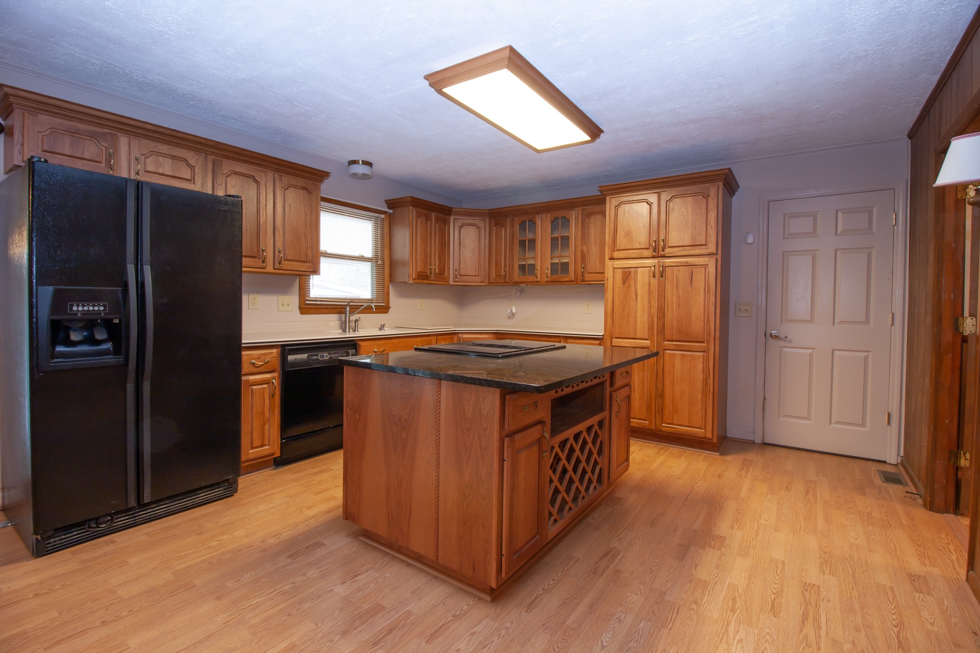 1431 Harrison Road Murfreesboro, TN 37128 - Photo 9 of 17 a kitchen with stainless steel appliances granite countertop a stove a refrigerator and a sink