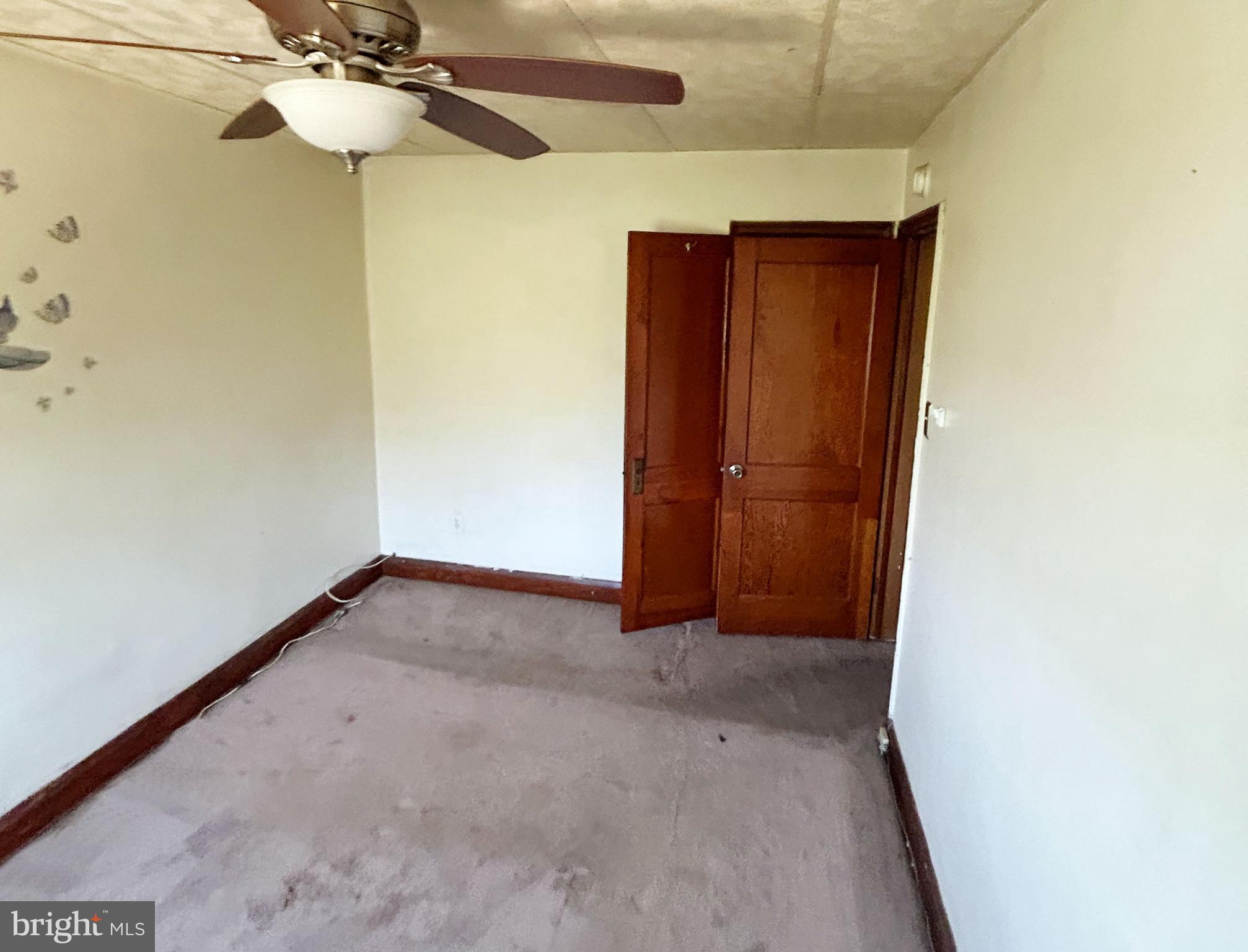 4014 Century Road Baltimore, MD 21206 - Photo 15 of 19 a view of a room with a ceiling fan
