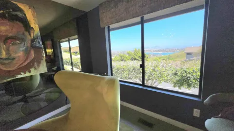 a kitchen with stainless steel appliances granite countertop a refrigerator a stove and a sink