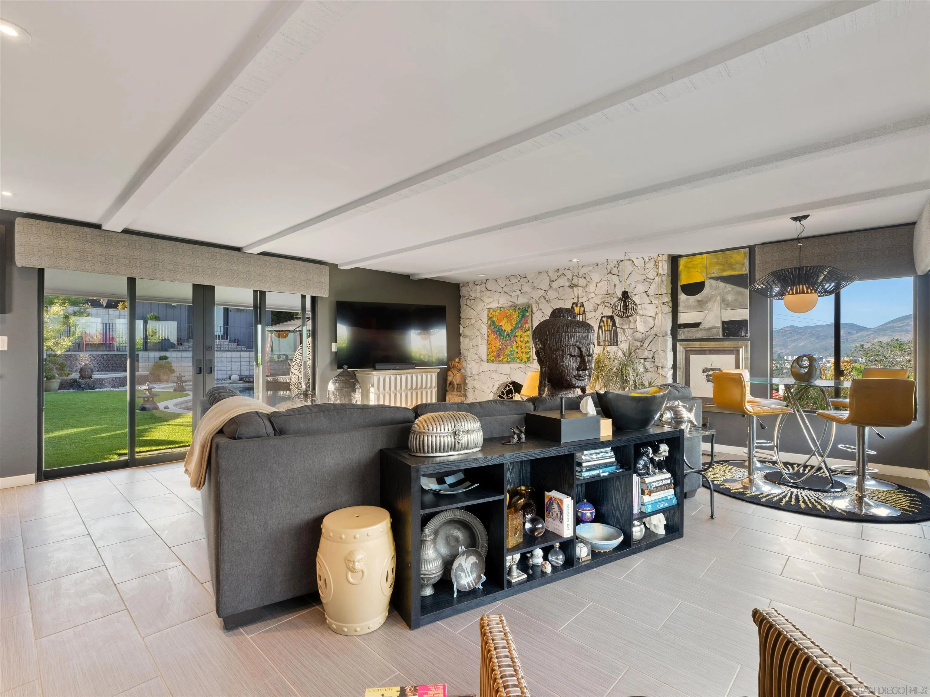 6315 Ridge Manor Avenue San Diego, CA 92120 - Photo 14 of 45 a living room with furniture floor to ceiling window and floor to ceiling window