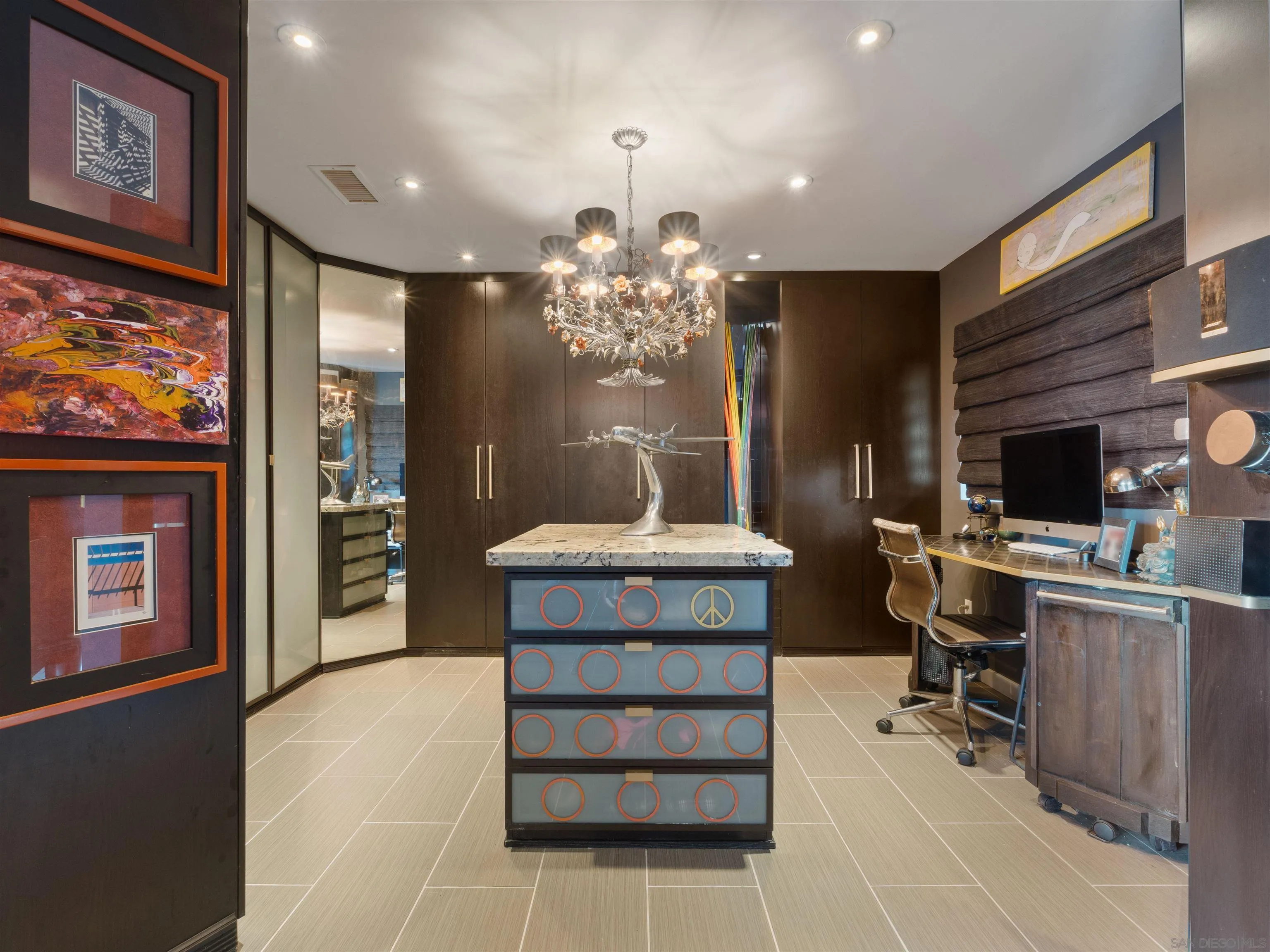 6315 Ridge Manor Avenue San Diego, CA 92120 - Photo 22 of 45 a view of a workspace room with furniture and chandelier