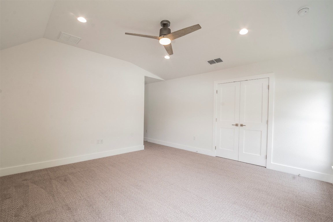 616 West Dittmar Road Austin, TX 78745 - Photo 11 of 37 an empty room with ceiling fan and window