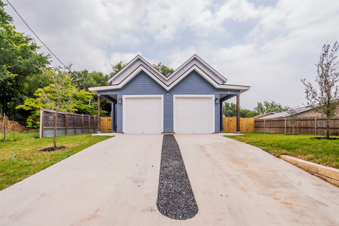616 West Dittmar Road Austin, TX 78745 - Photo 21 of 37 a view of a house with a yard and large tree