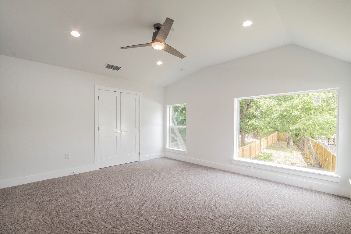 616 West Dittmar Road Austin, TX 78745 - Photo 10 of 37 an empty room with large windows