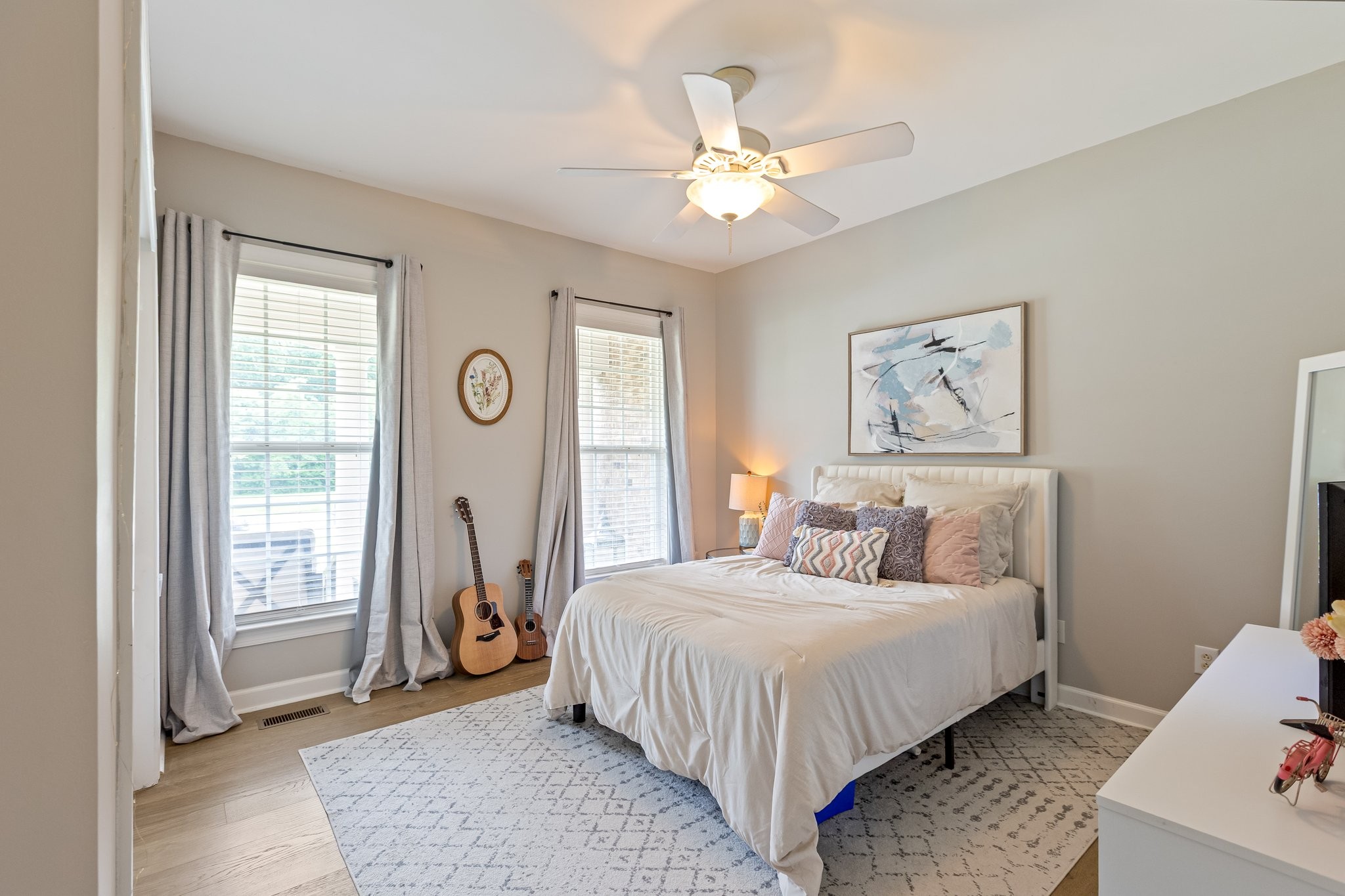 5048 Abington Ridge Lane Franklin, TN 37067 - Photo 11 of 64 a bedroom with a bed and a chandelier
