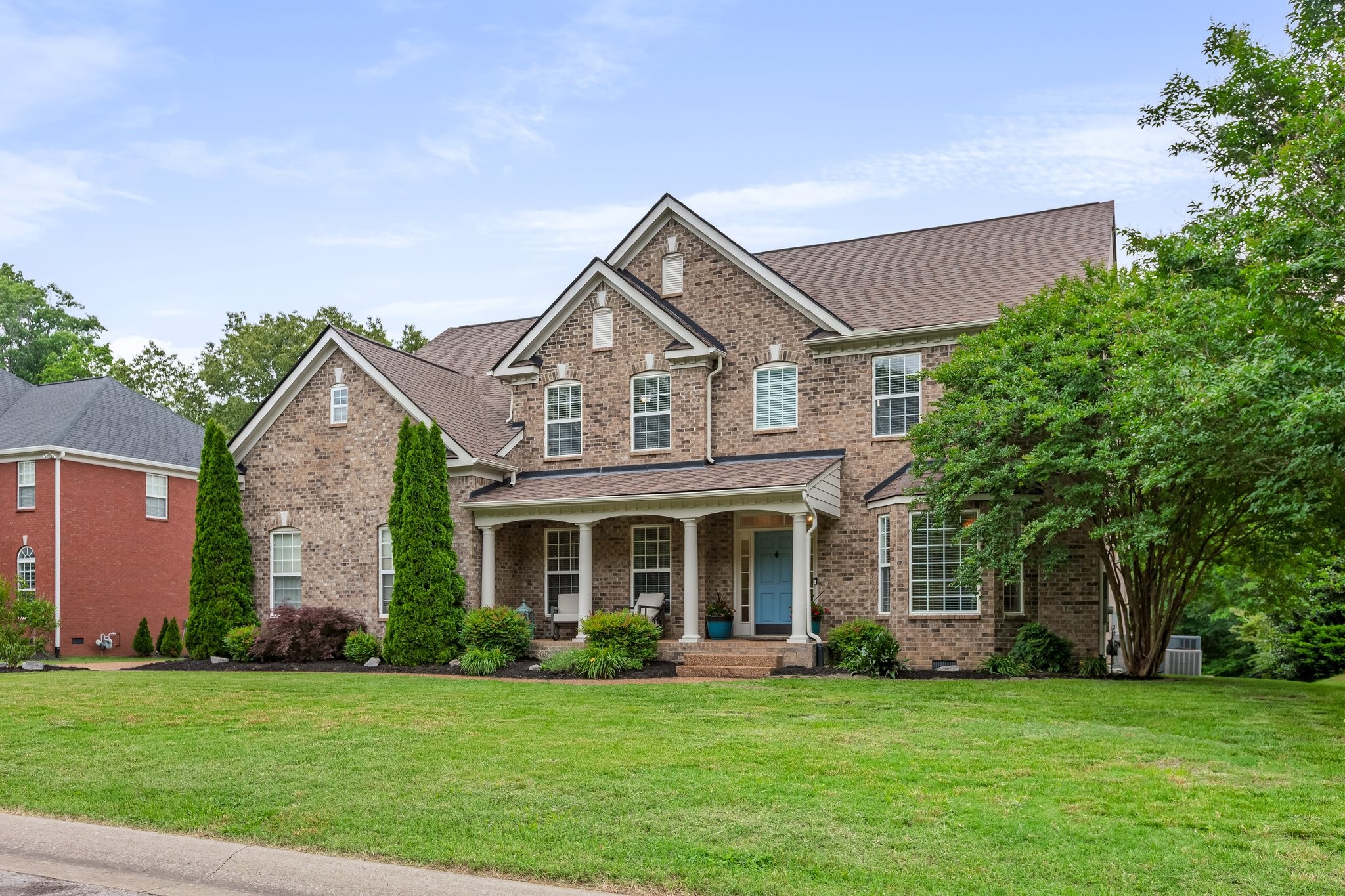 5048 Abington Ridge Lane Franklin, TN 37067 - Photo 2 of 64 front view of a house with a yard