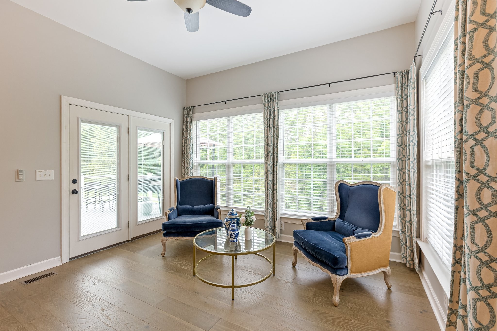 5048 Abington Ridge Lane Franklin, TN 37067 - Photo 29 of 64 a living room with furniture and a floor to ceiling window