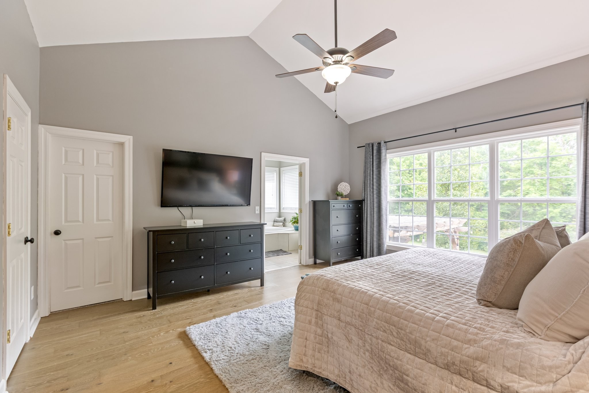 5048 Abington Ridge Lane Franklin, TN 37067 - Photo 34 of 64 a bedroom with a bed and a flat screen tv