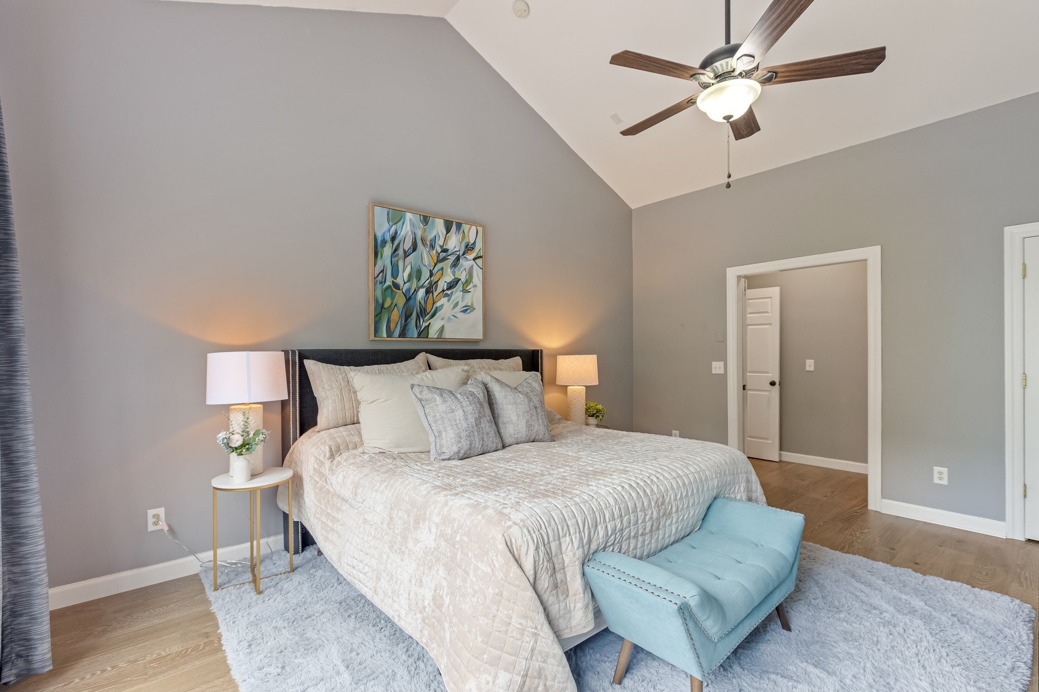 5048 Abington Ridge Lane Franklin, TN 37067 - Photo 35 of 64 a bedroom with a bed and a chandelier