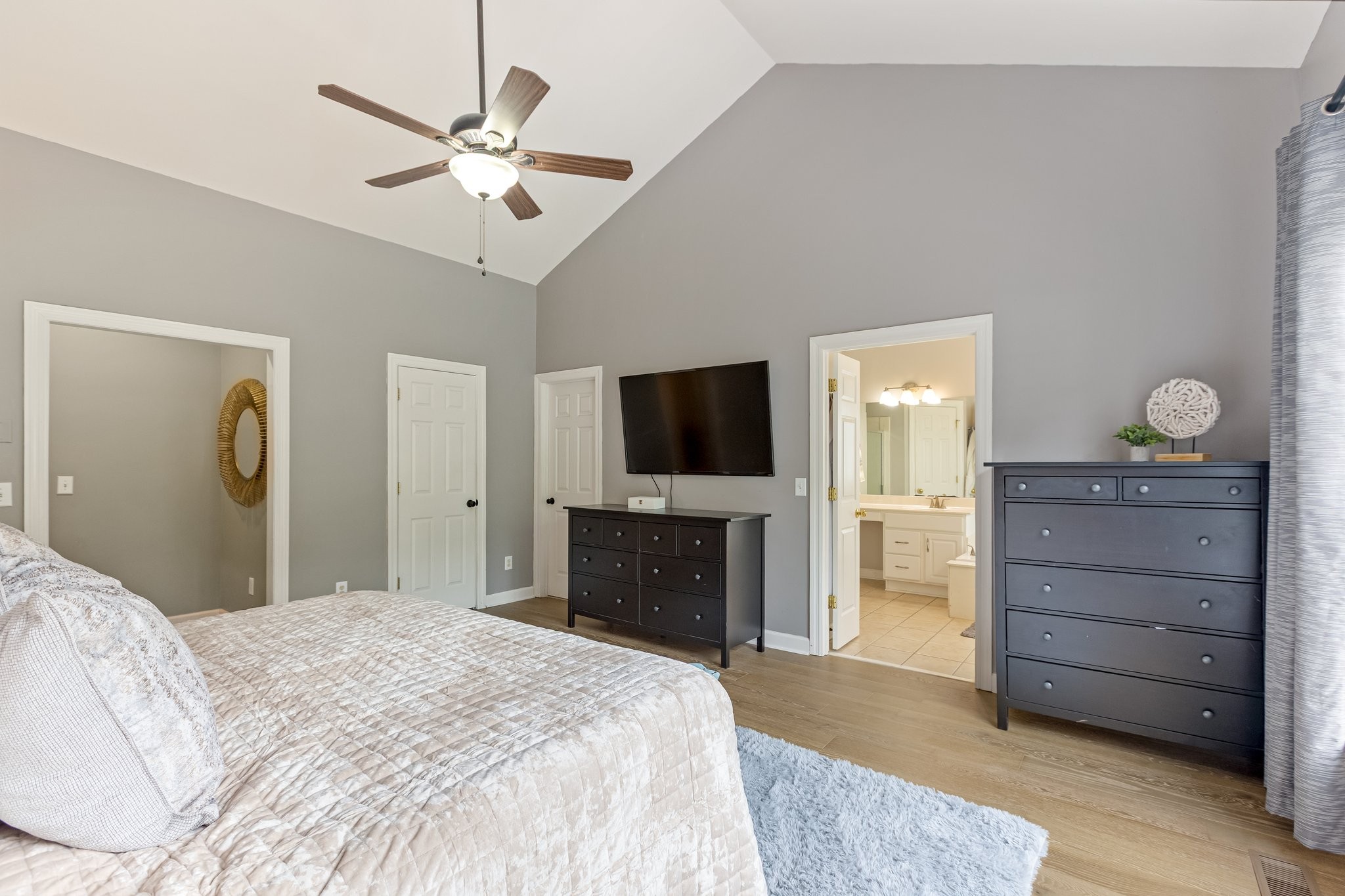 5048 Abington Ridge Lane Franklin, TN 37067 - Photo 36 of 64 a bedroom with a bed and a flat screen tv