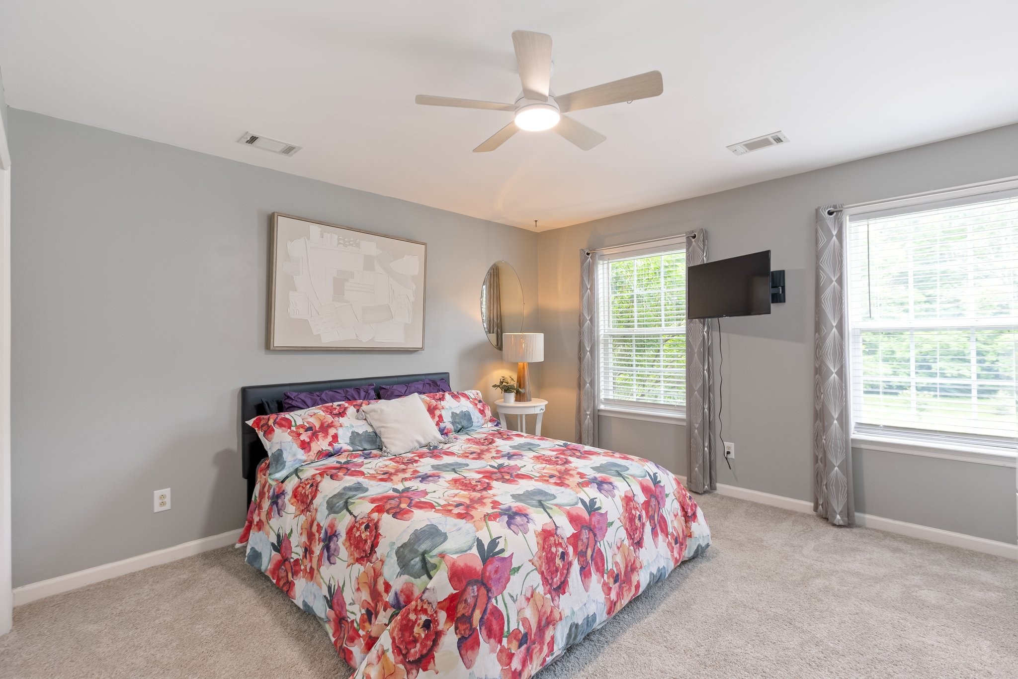 5048 Abington Ridge Lane Franklin, TN 37067 - Photo 45 of 64 a bed sitting in a bedroom next to a window