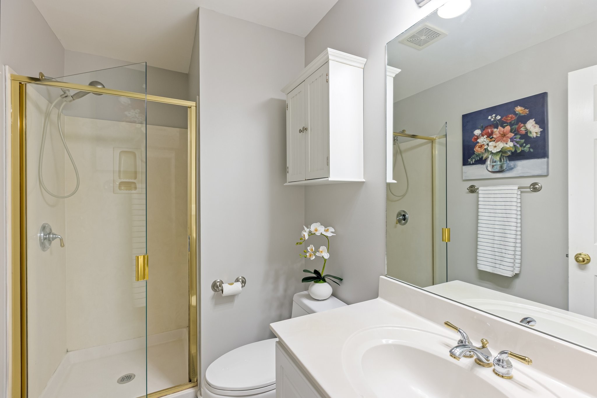 5048 Abington Ridge Lane Franklin, TN 37067 - Photo 50 of 64 a bathroom with a sink toilet and shower